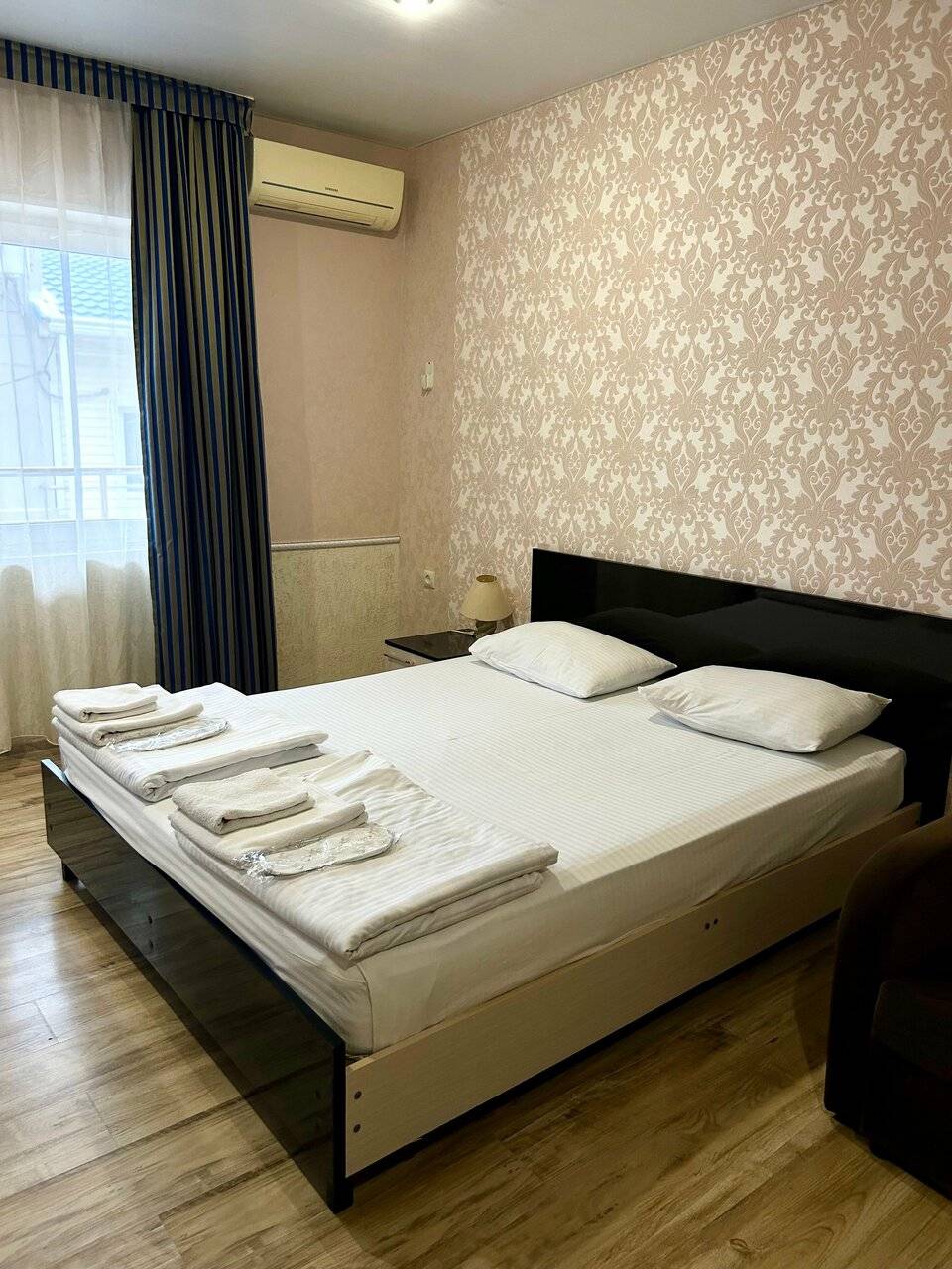 Трехместный номер с балконом